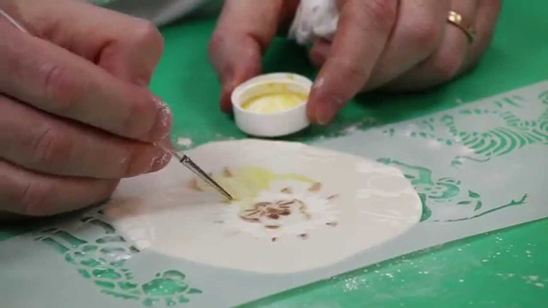 painting-stencils-onto-cookies