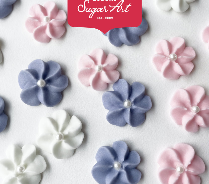 Purple Royal Icing Drop Flowers with Pearl Centers