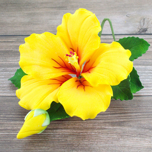 Yellow Tropical Hibiscus with Leaves